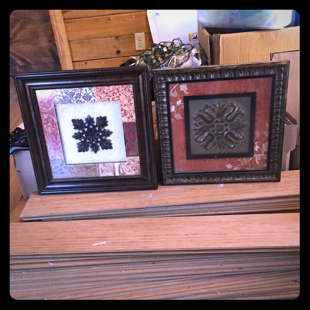 Two framed art work pieces.